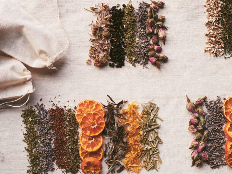 dried flowers herbs and other plant ingredients shown grouped together to create four tea blends by Pamela Anderson