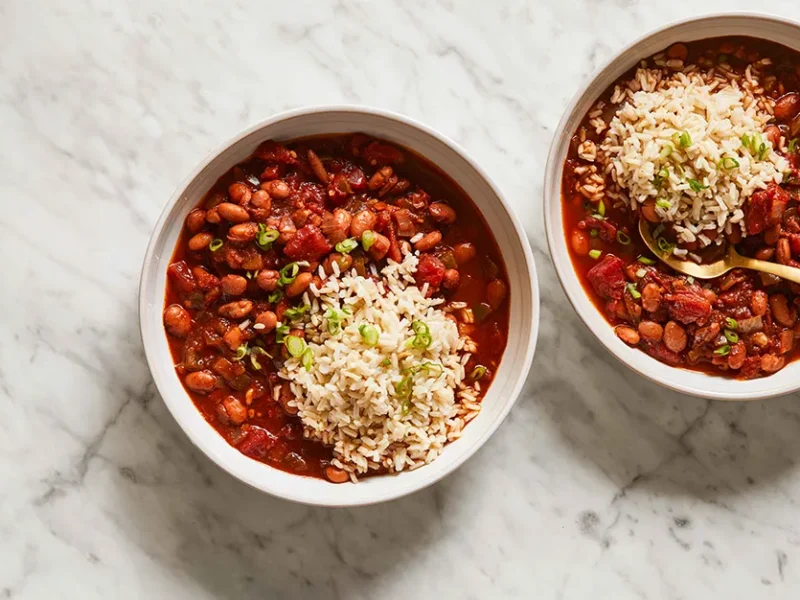 Two bowls of 30-Minute Chili with a spoonful of brown rice in each