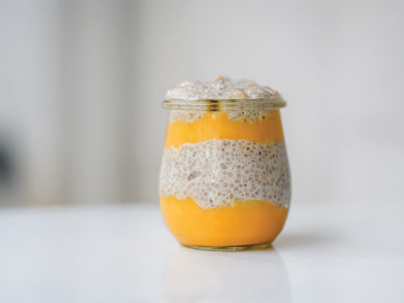 Tropical Chia Pudding with alternating layers of mango and chia